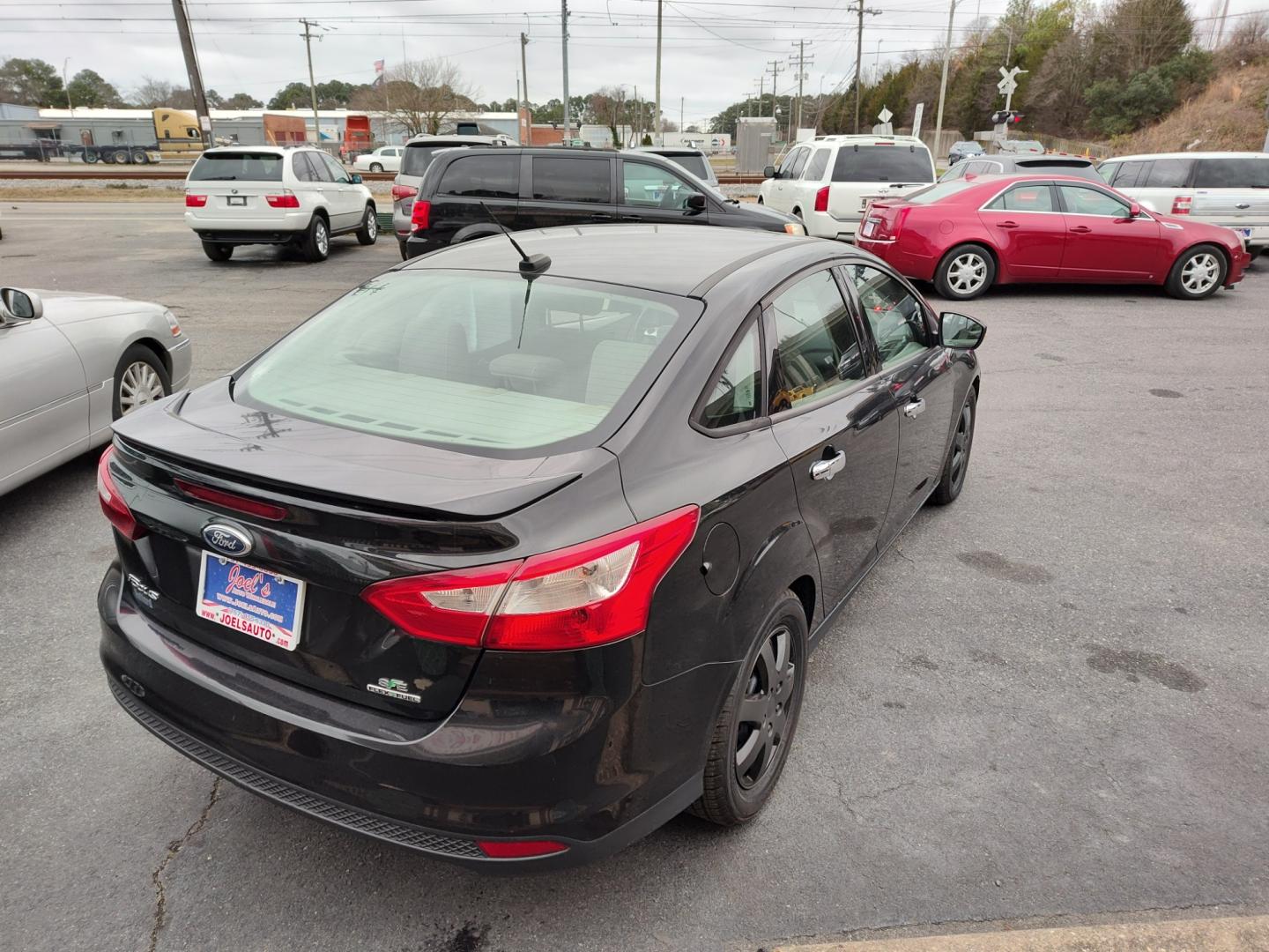 2014 Black Ford Focus (1FADP3F27EL) , Automatic transmission, located at 5700 Curlew Drive, Norfolk, VA, 23502, (757) 455-6330, 36.841885, -76.209412 - Photo#15